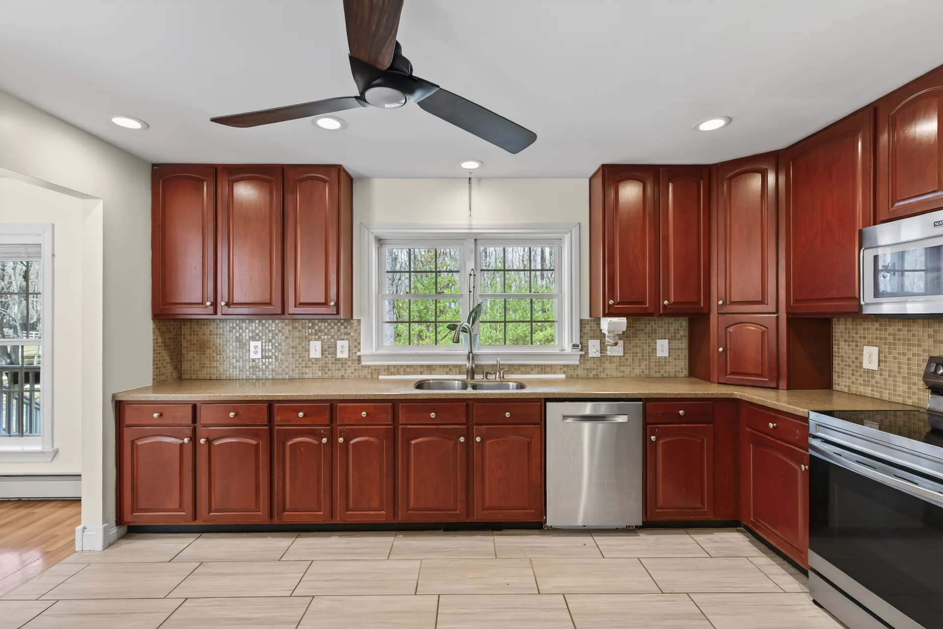 Kitchen sink with window over backyard