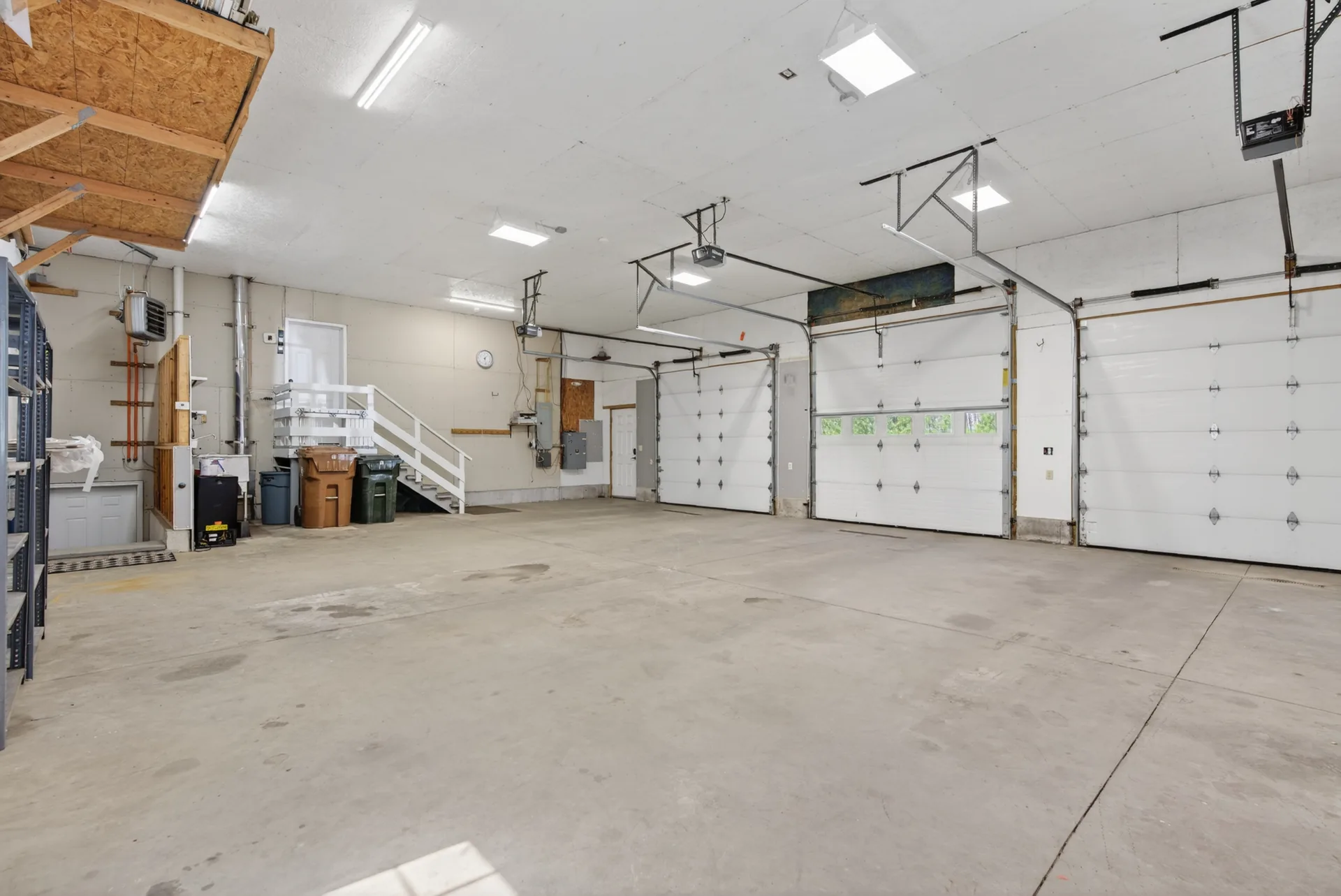 Garage interior with stairs to house