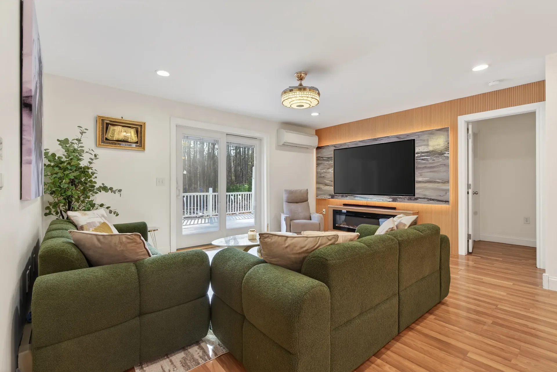 Family room staged with media wall