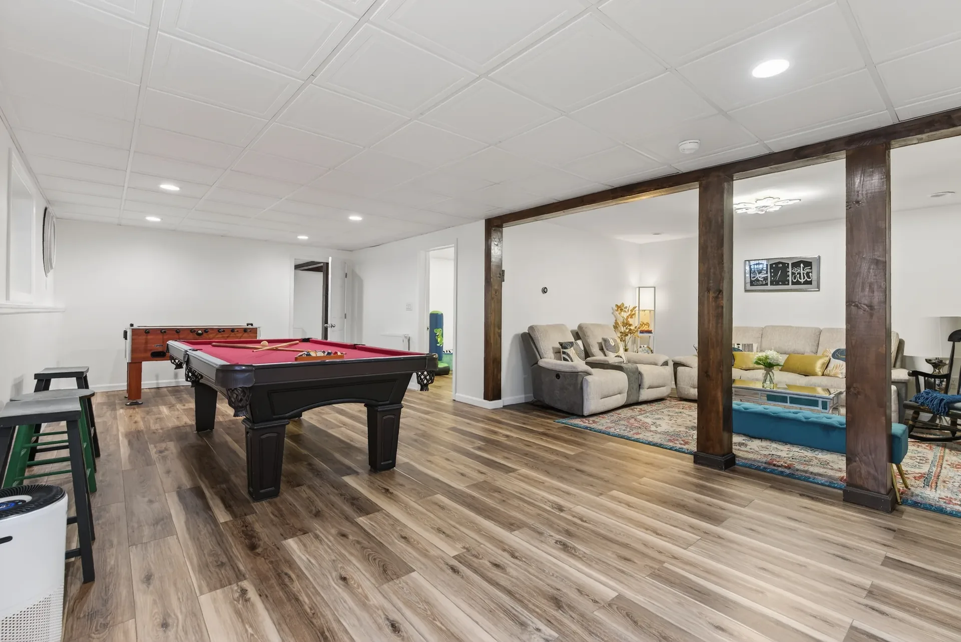 Lower-level game area with pool table