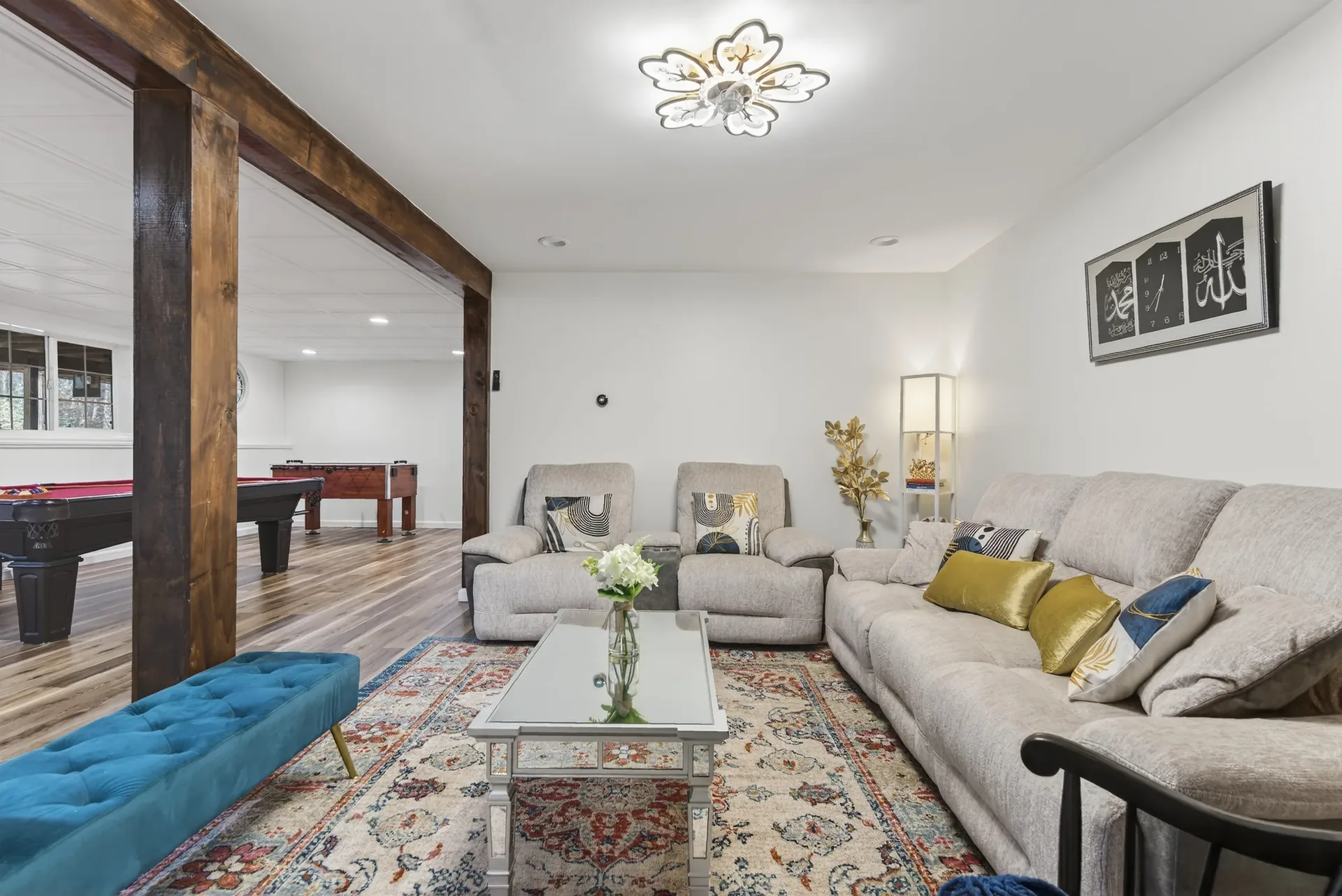 Lower-level staged — living area to game room