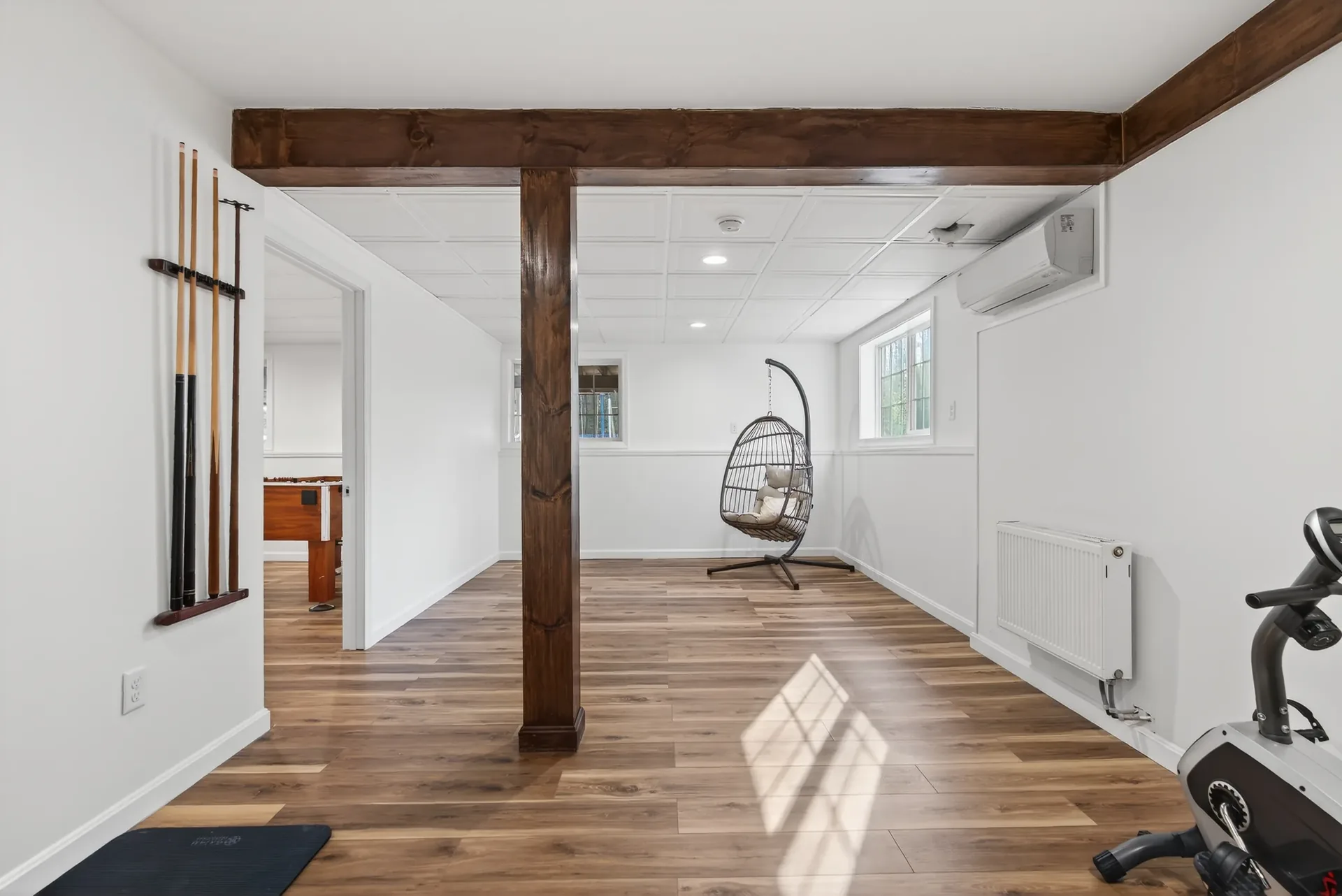 Lower-level flex room with hanging chair